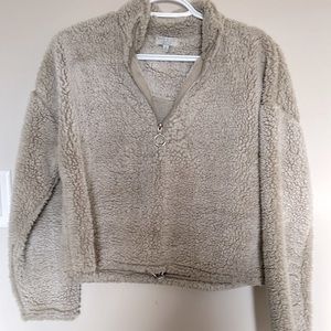 Women’s gray half zip faux fur pullover top.